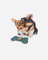 Dog using Yummee Lick Pad